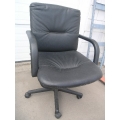 Black leather rolling chair with arm rest