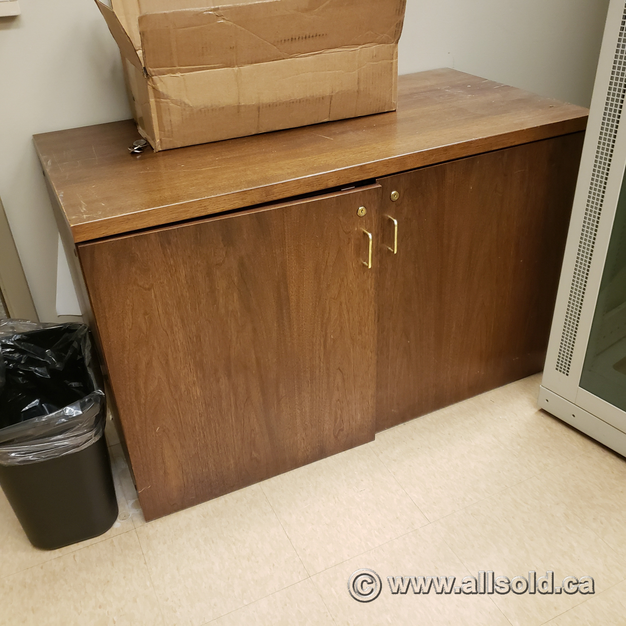 Brown storage cabinet with doors